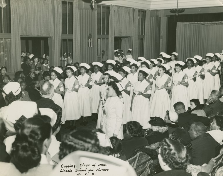 Photograph of nurse graduates during capping ceremony