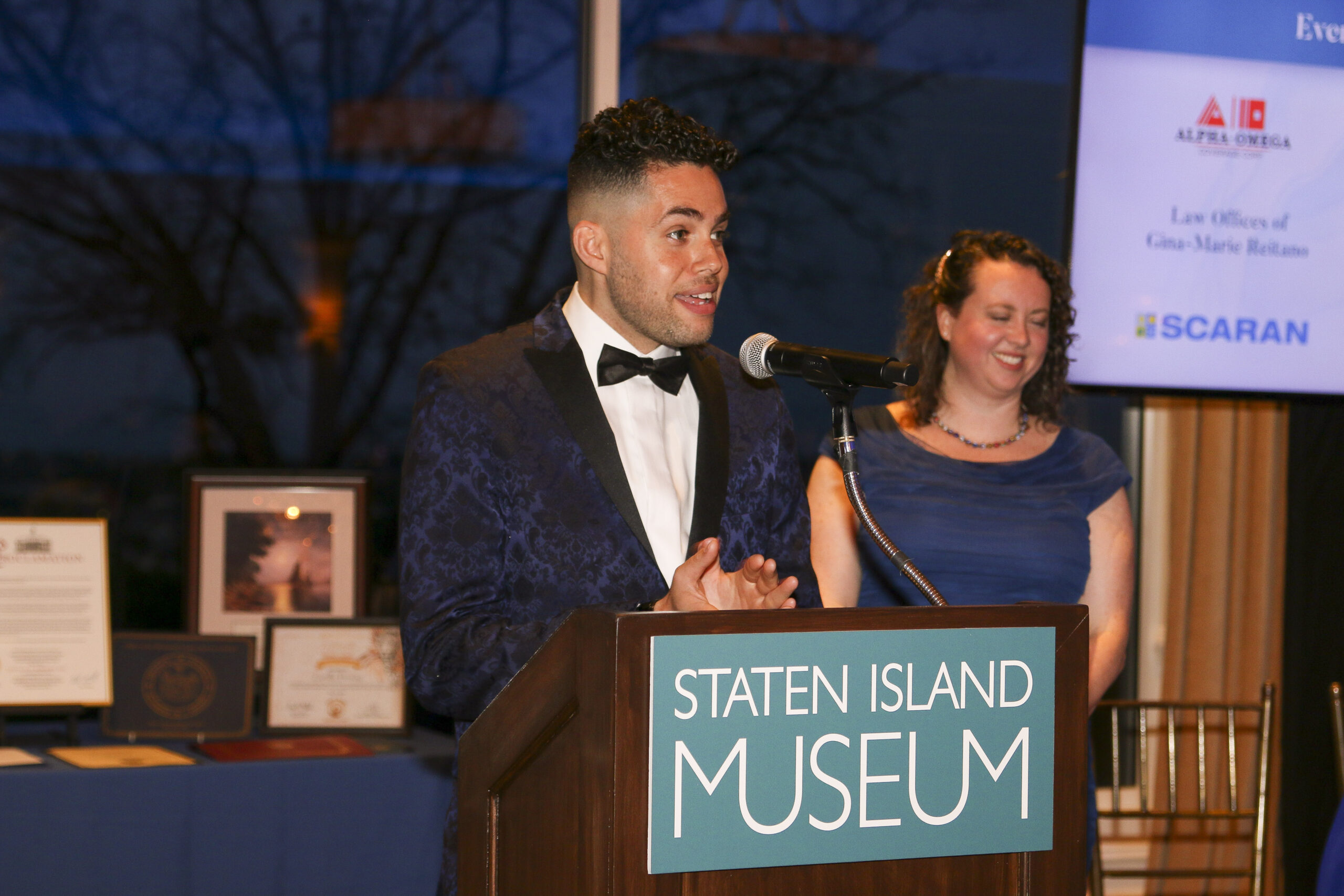 Staten Island Museum Trustee Niles French at the podium
